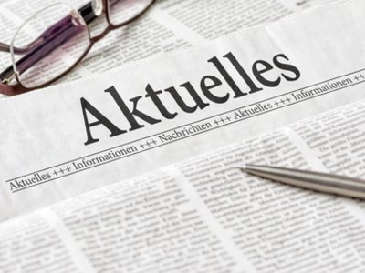 Zeitung mit der Aufschrift Aktuelles