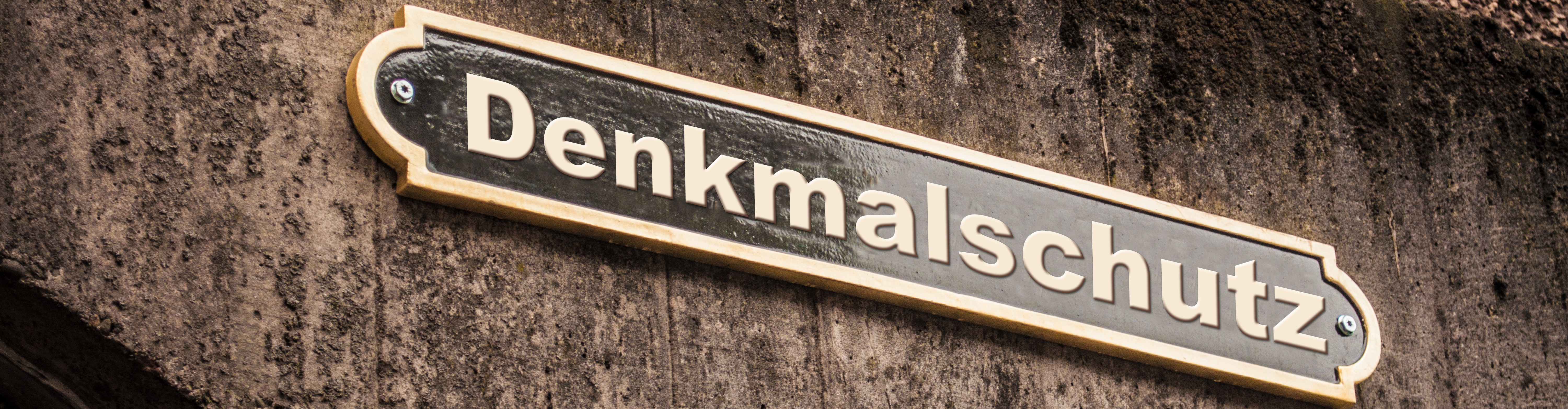 Straßenschild mit der Aufschrift Denkmalschutz